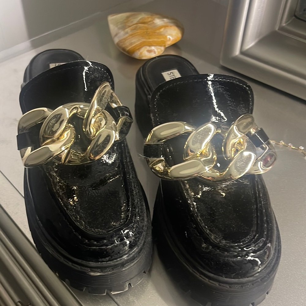 Black mule with silver buckle